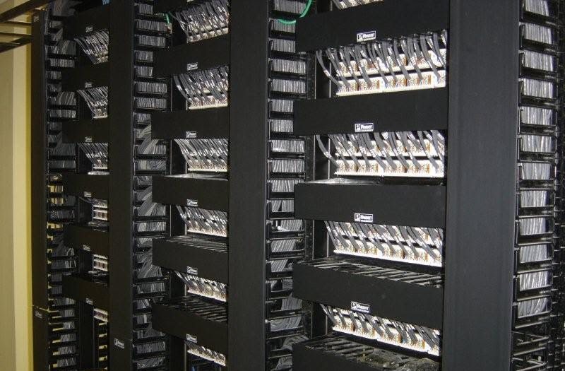 High-density patching: Horizontal and vertical cable management for hundreds of terminated drops.